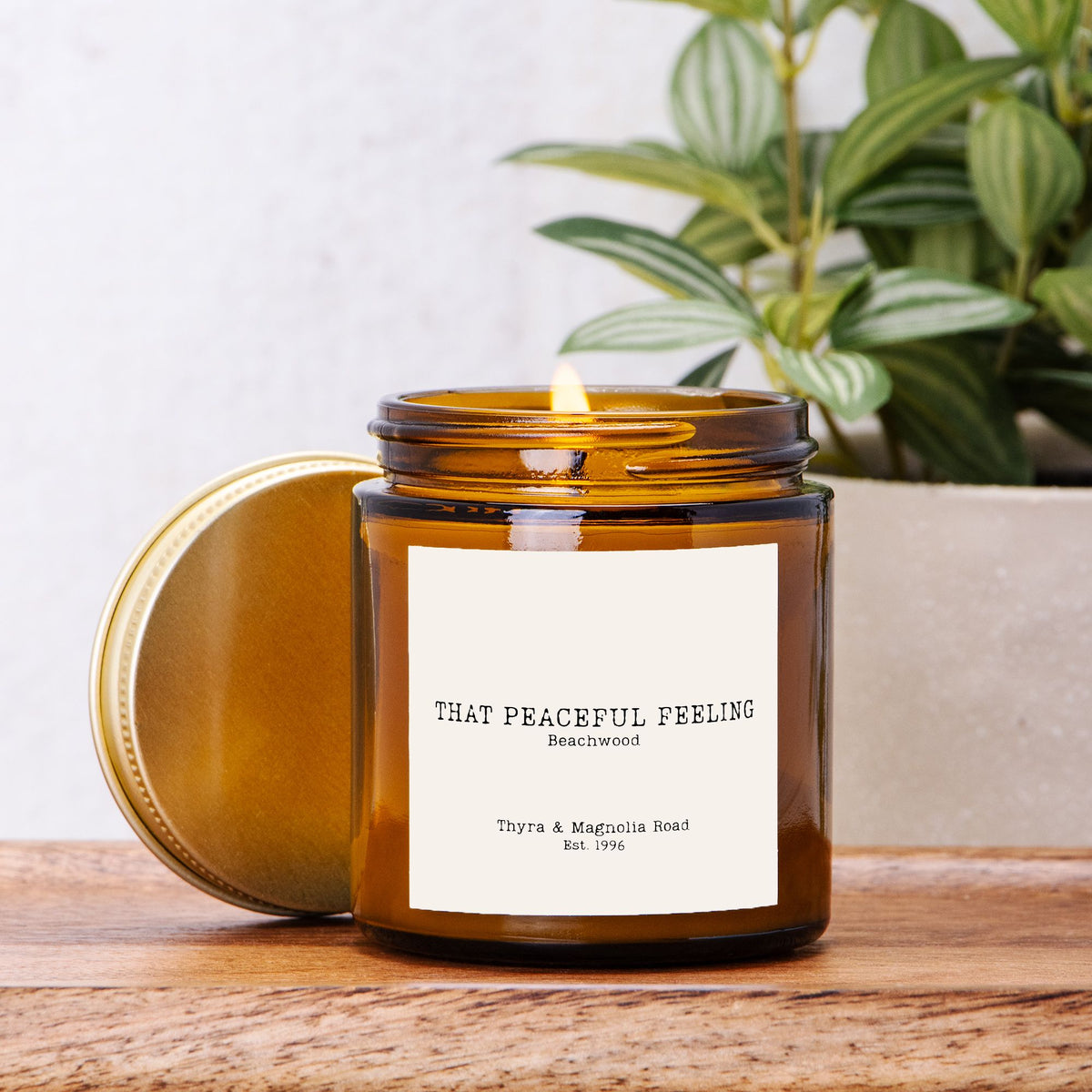 That Peaceful Feeling Beachwood stearinlys ravfarvet glas 113g